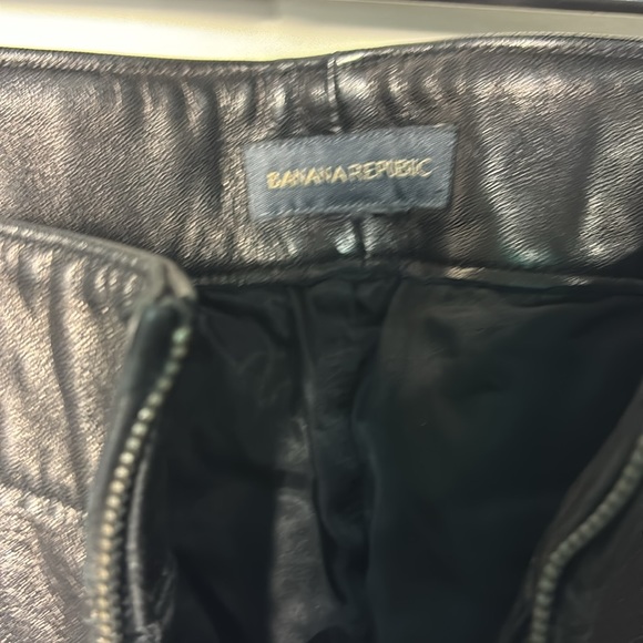 Banana Republic blk leather pants. Front zipper. Bttm left leg torn. 15" across - Picture 5 of 14